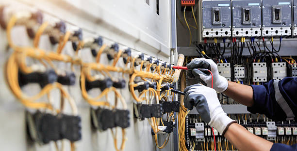 Professional Electrician technician working in Pine Brook, NJ